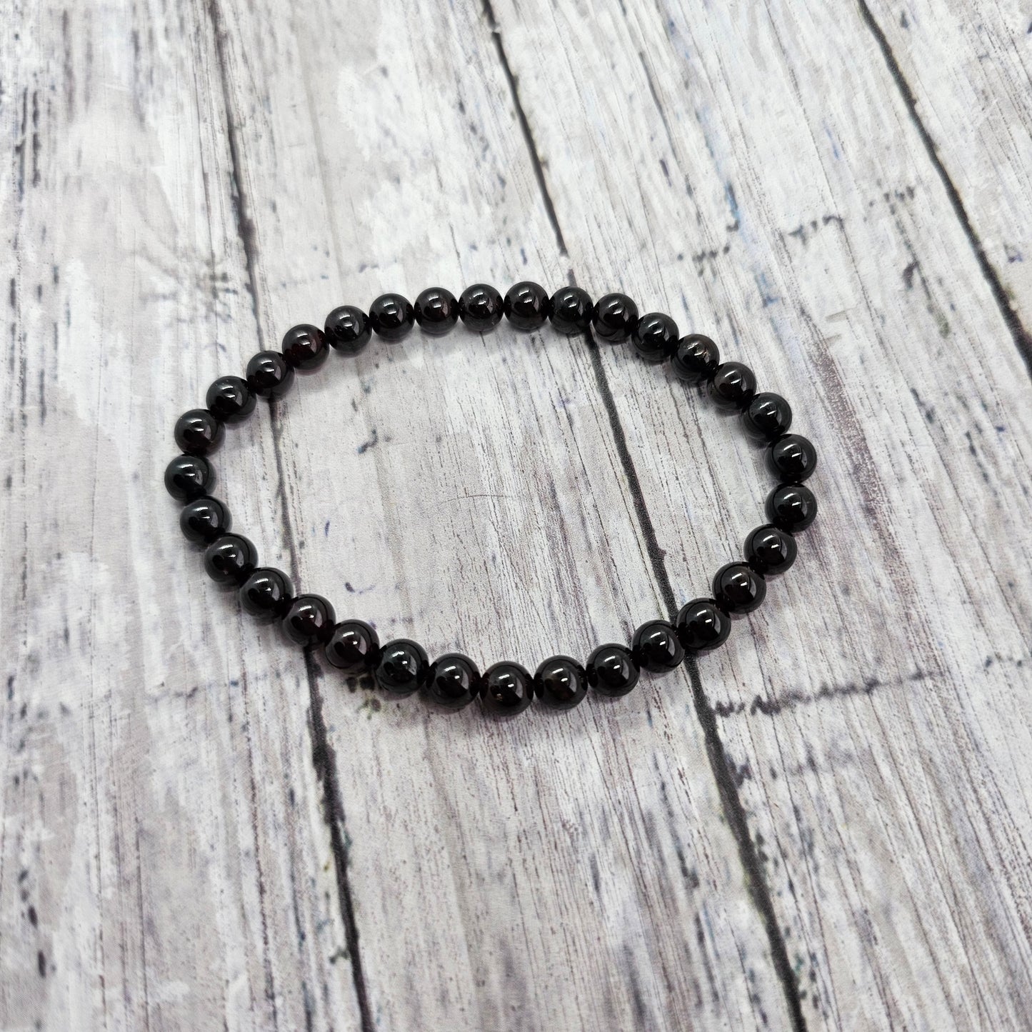 6mm Reiki Infused Garnet Bracelet