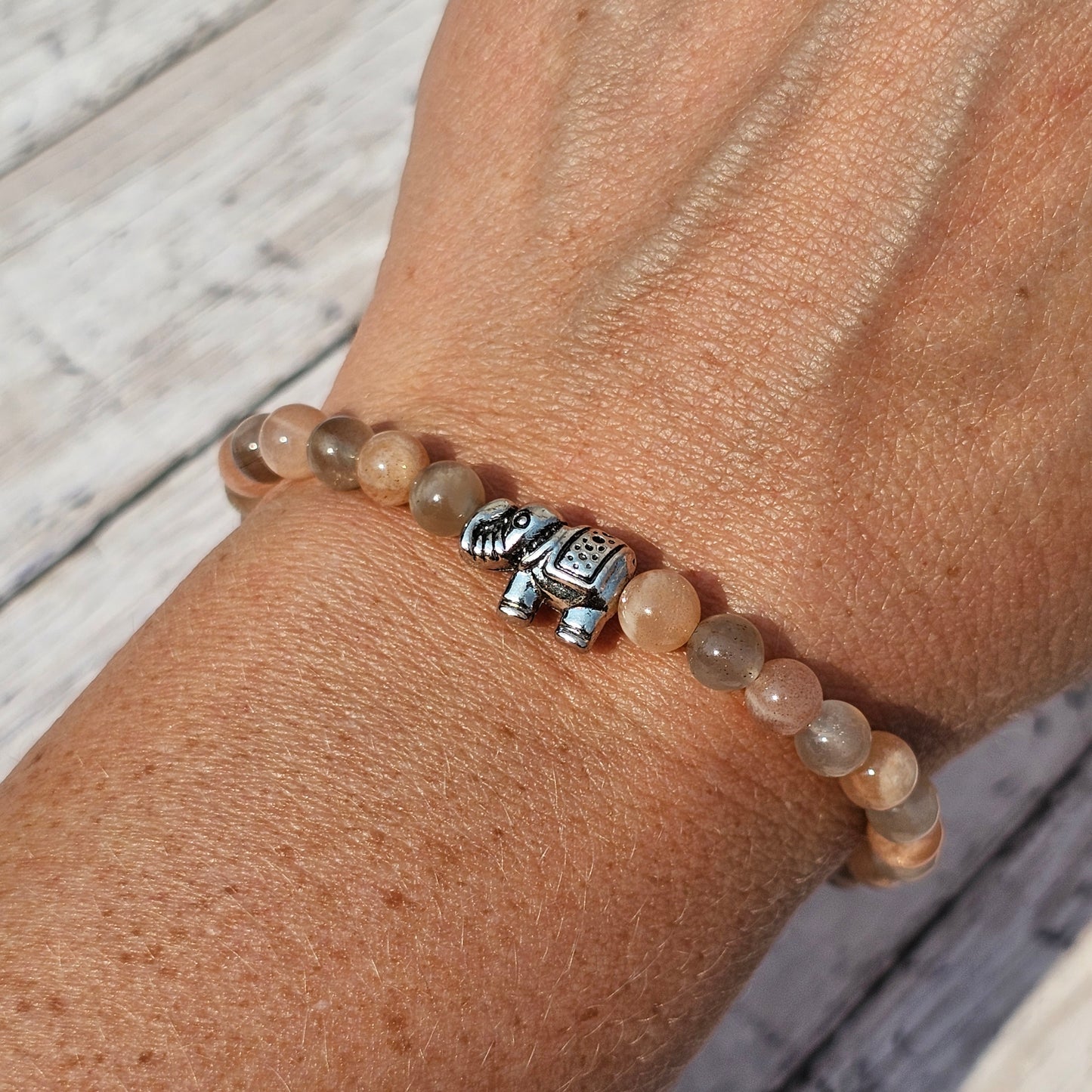 5mm Reiki Infused Skeletal Sunstone Bracelet with Elephant Charm