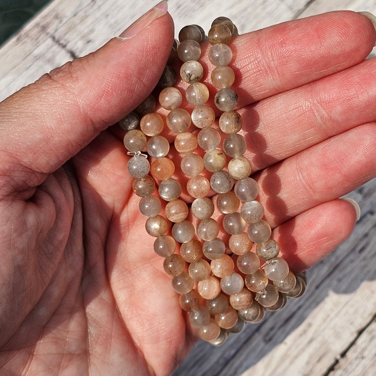 5mm Reiki Infused Skeletal Sunstone Bracelet with Elephant Charm